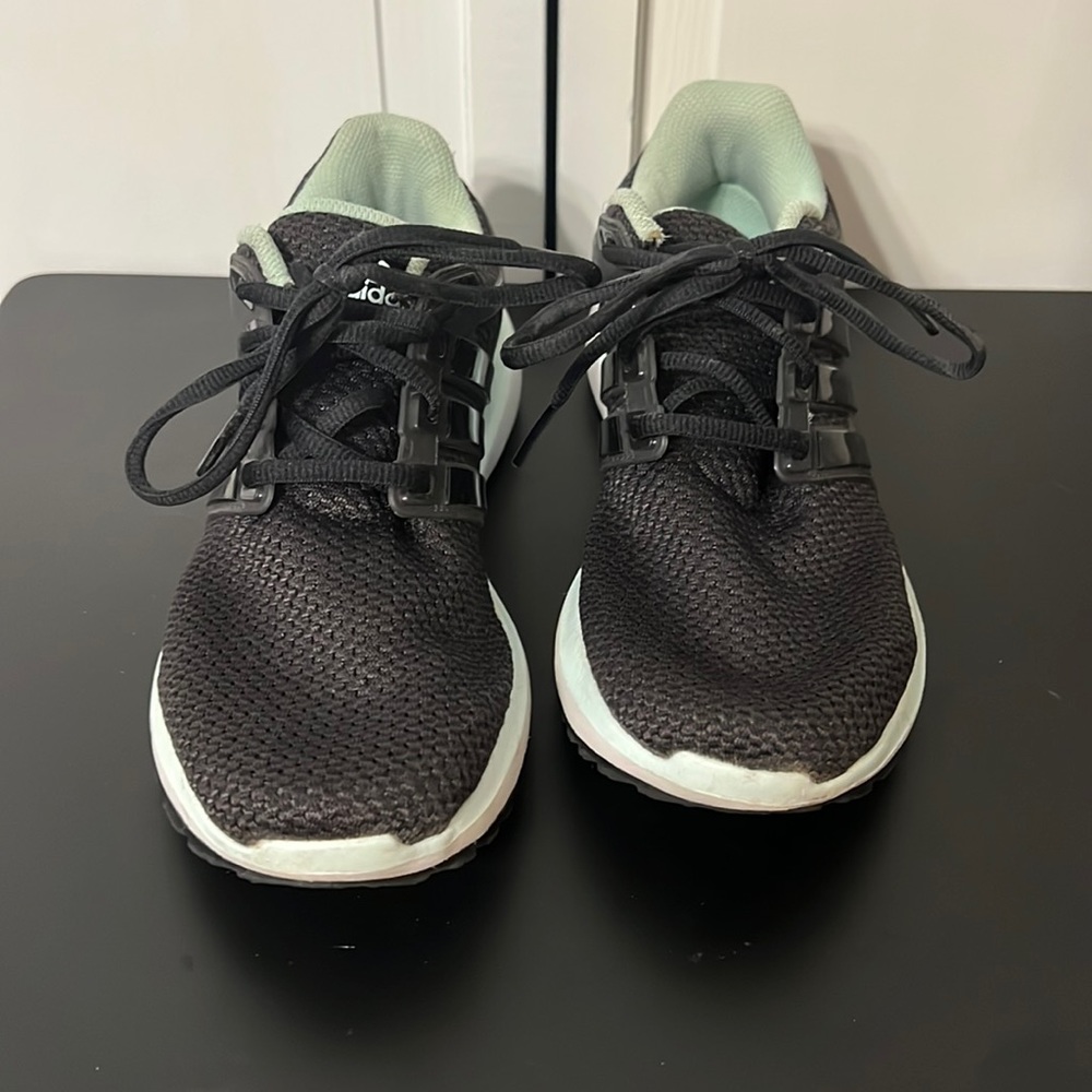 Adidas. Women’s 7. Black with mint green inner lining.
